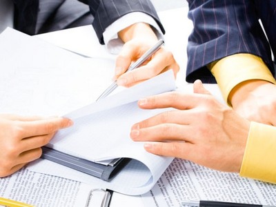 Image of people’s hands during business conversation at meeting